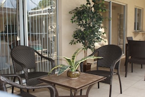 Enjoy morning coffee or an afternoon cooler...the lanai poolside is the best!