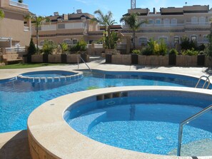 2nd out door pool with out door spa and children’s play area
