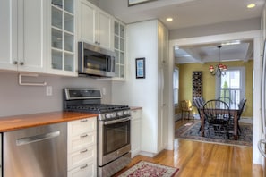 The kitchen leading into the dining room.