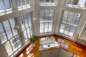 The kitchen sink looking down from the 2nd floor landing.