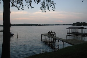 Backyard view from the house. Dock is just 30 feet from the house. 
