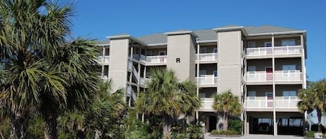 View of condo building from parking lot