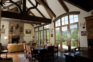 Living Room view doors open to huge private deck.60 in TV views of mt timpanogas