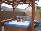 Enjoying the Always Hot Jacuzzi with Pergola Cover, Misters installed later