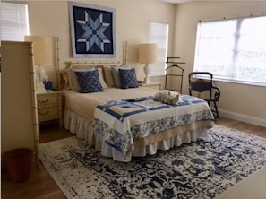 A serene, comfortable master bedroom suite.