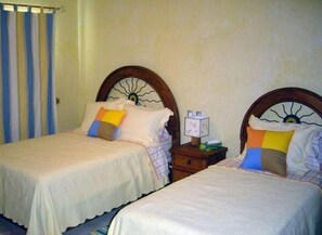 2nd Bedroom with Balcony overlooking pool & golf course (1 Dble Bed + 1 Twin)