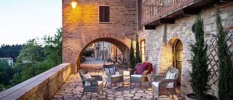 View of the 2 terraces with valley view and lounging by the indoor pool