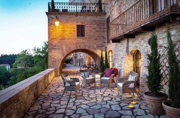 View of the 2 terraces with valley view and lounging by the indoor pool