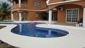 View of Pool Size & Form. Shallow very areas for small children by patio