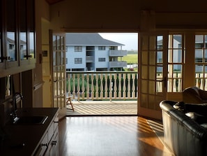 Great room open to large front porch with view of  intracoastal waterway.