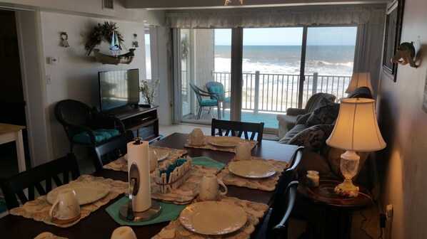 Dining area with 6 high chairs and high table; all dishes & silverware included!