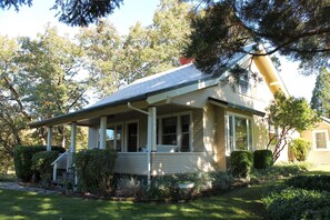 Front of house with large porch