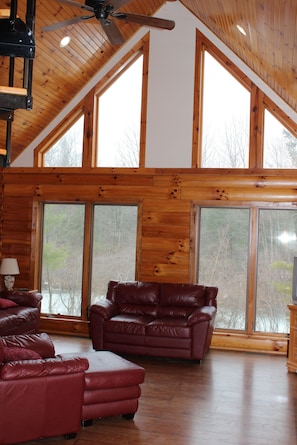 The living room gets lots of sun--and has gorgeous views of the lake.