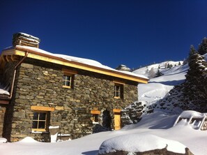 southern view of the upper chalet. on the backward, you can see the chairlift on