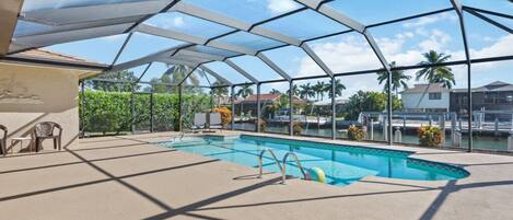 Large Screened pool and patio with full southern sun exposure