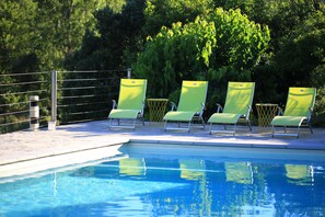 The secluded pool is on the South side of the house.  Great view of the valley.