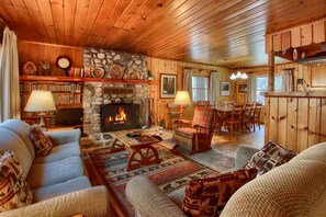 Living room with a beautiful rock fireplace