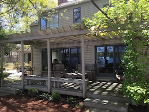 Sit outside on the back decks and watch the sunset over the water as boats go by