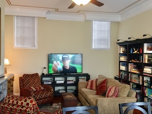 The living room is a nice size, for perspective the flat screen TV is a 60”.