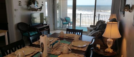 Dining area with 6 high chairs and high table; all dishes & silverware included!