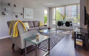 Large, bright living area and dining looks out onto terrace