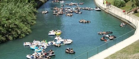 Bird's eye view of the Comal River in full swing