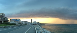 View of Brant Rock village from in front of the home. Sandy beach beyond Jetty