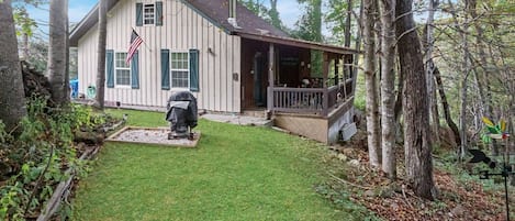 Enjoy the sounds of the stream as it flows down the waterfall while barbecuing 