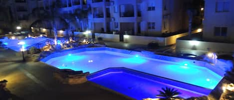 Pools by night.