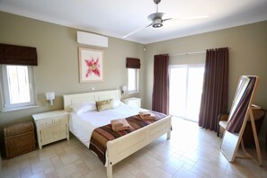 Master bedroom with near silent 
air-conditioning, separate ensuite bath/shower
