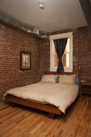 queen bed in bedroom