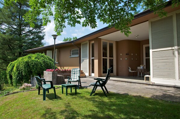 Main entrance, the porch and patio