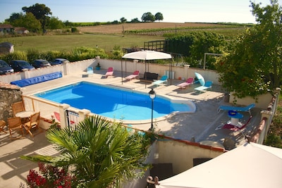 Kids friendly rental for 12 people in converted farm with enclosed heated pool