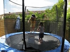 Large trampoline, play barn, chickens, quail......