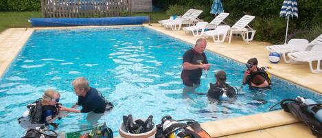 Try scuba-diving  in our lovely heated pool !