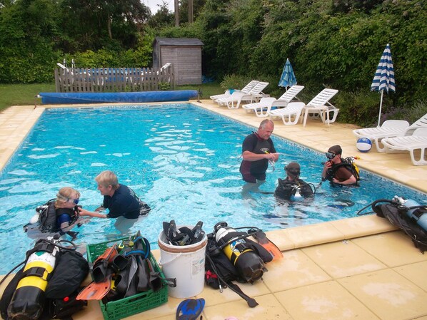 Try scuba-diving  in our lovely heated pool !