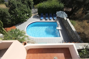 View of the pool from Romeo and Juliet Balcony to master bedroom.