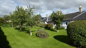 Babingtons Cottage.  The Orchard facing the Lammermuirs Hills.