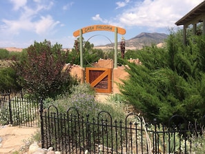 Our "Rabbit (protected) garden' entry to patio... Please keep gate closed...!