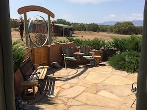 Patio with unstoppable views of Jemez Mtns. & skies. Lots of seating groups...