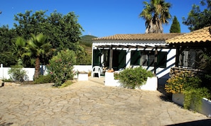 Cottage Front entrance in all around mature gardens