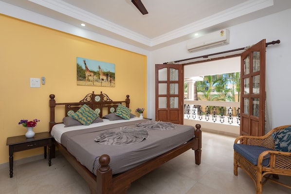 Spacious bedroom with attached balcony