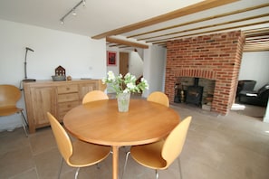 Dining room with log burning stove