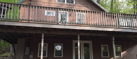 House settled back in Private Drive and Partial Lake Views, Beach near driveway