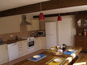 Fully equipped kitchen diner, overlooking the pool 