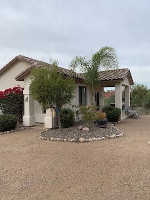 Casita side view showing 2021 planting and side patio. 