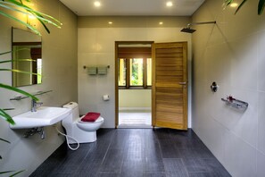 Spacious Bathroom 1 with walk in shower and separate bath tub