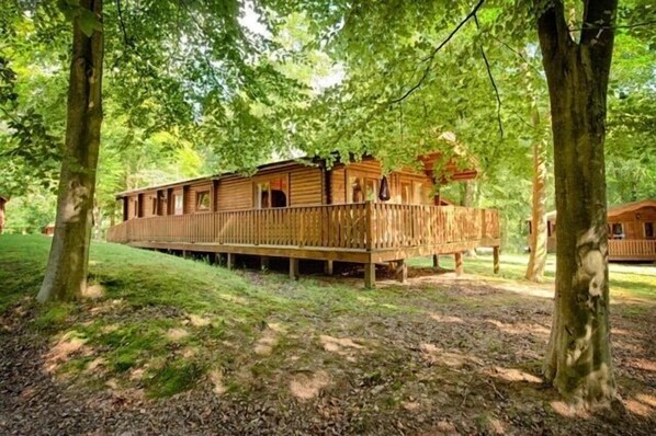 Lodge 39 sits serenely in the heart of Kenwick woods boasting stunning views.