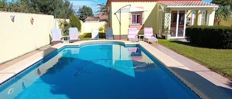 View of Pool and front of house