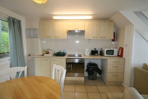kitchen with oven/hob fridge and freezer